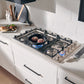 THOR Kitchen Package - 30" Wall Oven, 36" Drop-in Cooktop, Range Hood, AP-HEW3001-DC-36